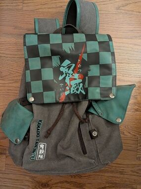 Source Unknown Green and Black Checkered Anime Backpack with Red Accent